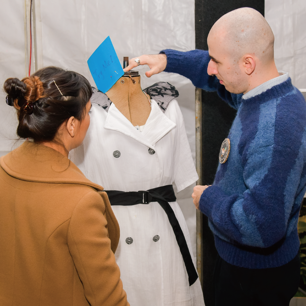 The team members are tidying up our dress